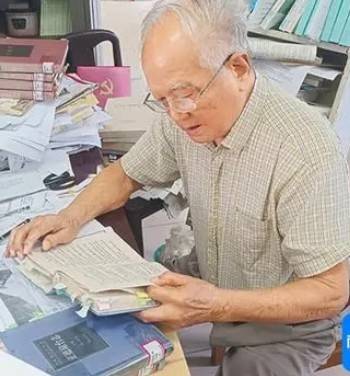 周伟民（海南大学退休干部）