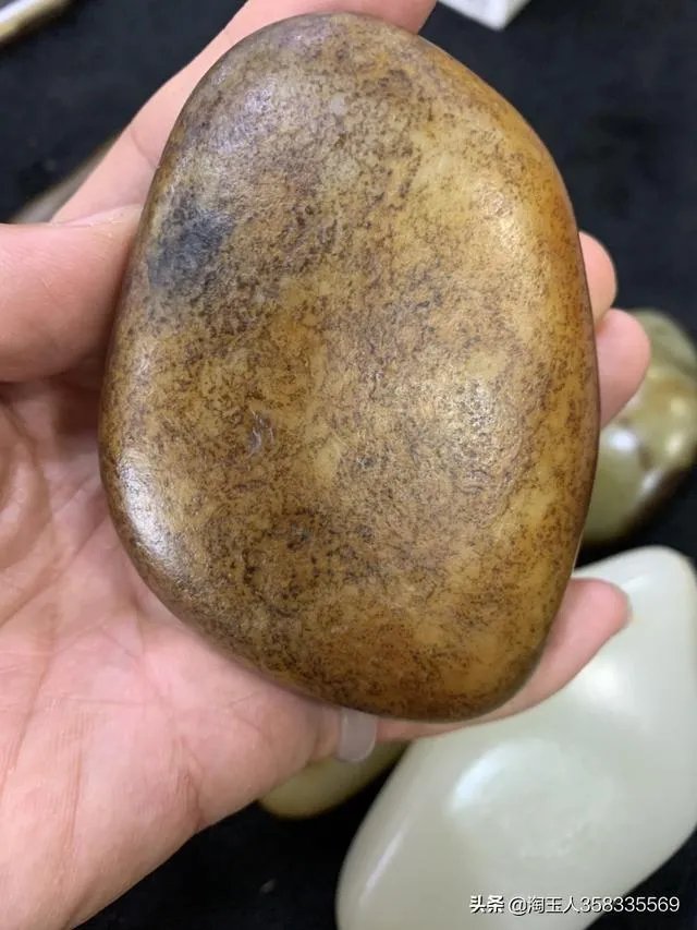 怎样挑选新疆和田玉把件?