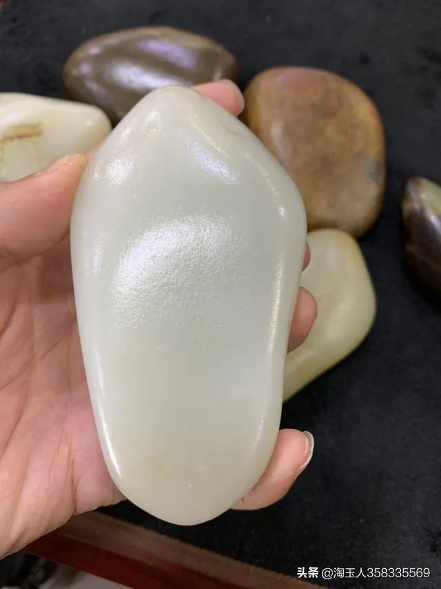 怎样挑选新疆和田玉把件?