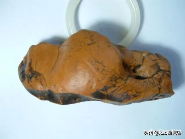 怎样挑选新疆和田玉把件?