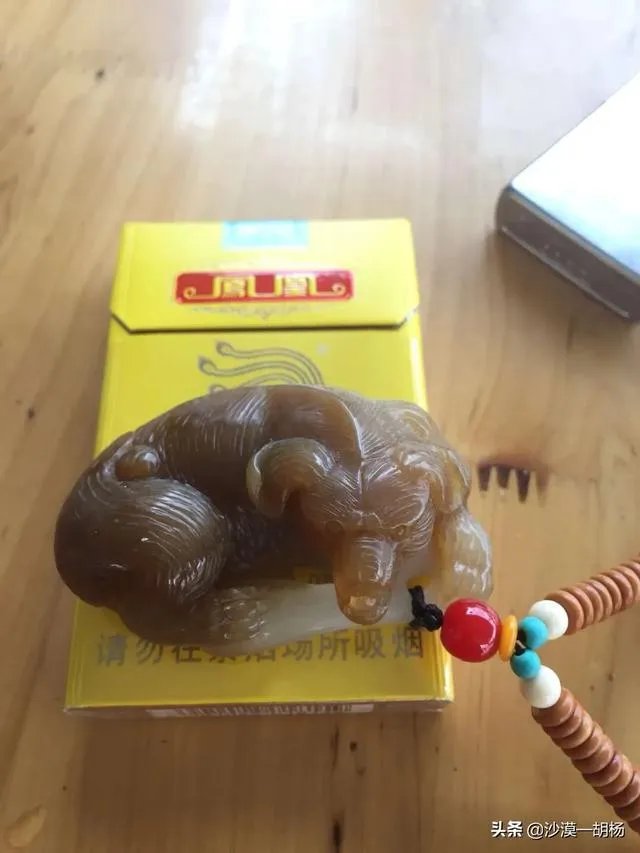 怎样挑选新疆和田玉把件?