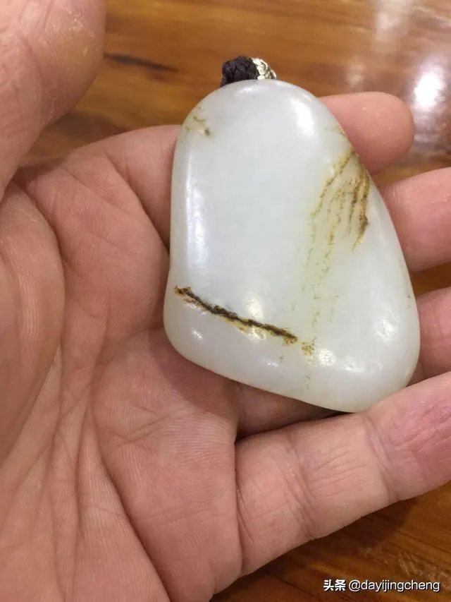 怎样挑选新疆和田玉把件?