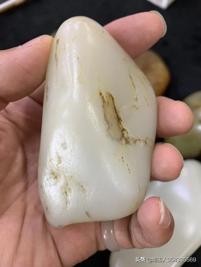 怎样挑选新疆和田玉把件?